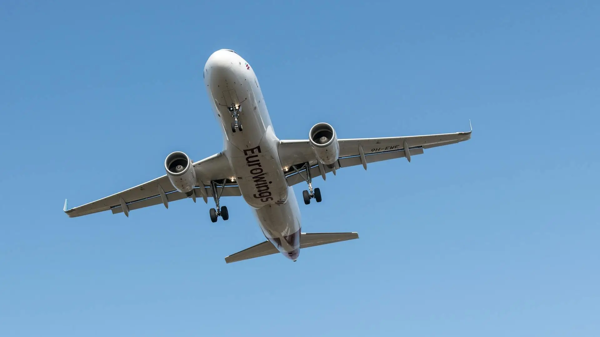 Cargo airplane loading at airport terminal
